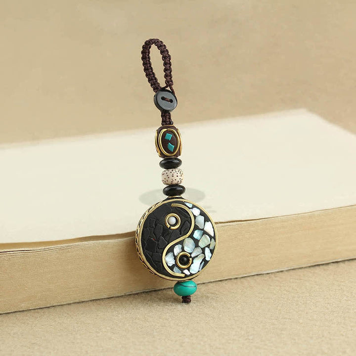 Buddha Stones Portachiavi con ciondolo Yin Yang in legno di wengé, simbolo di armonia - image 1