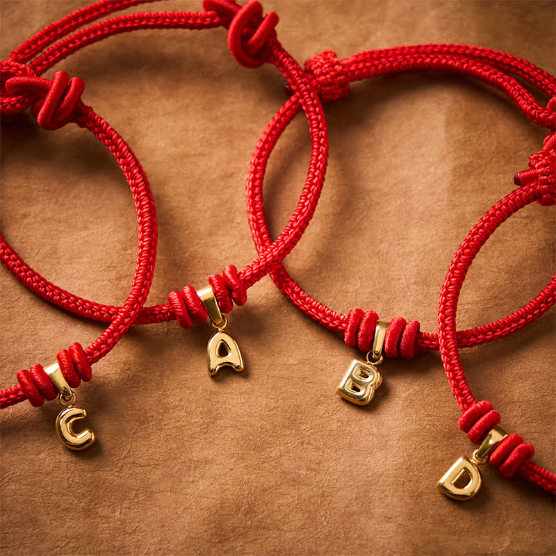 Buddha Stones Braccialetto Faith in acciaio al titanio con lettere e cordino rosso - image 0