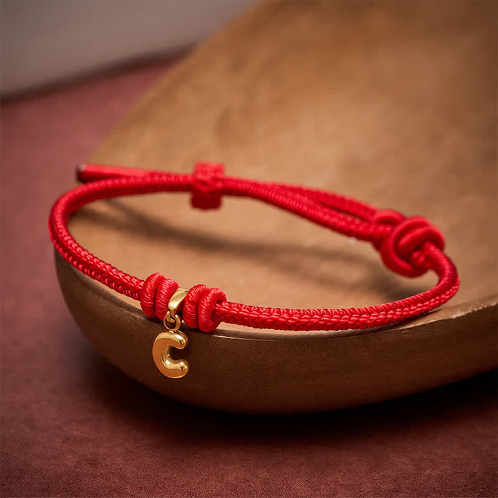 Buddha Stones Braccialetto Faith in acciaio al titanio con lettere e cordino rosso - image 18