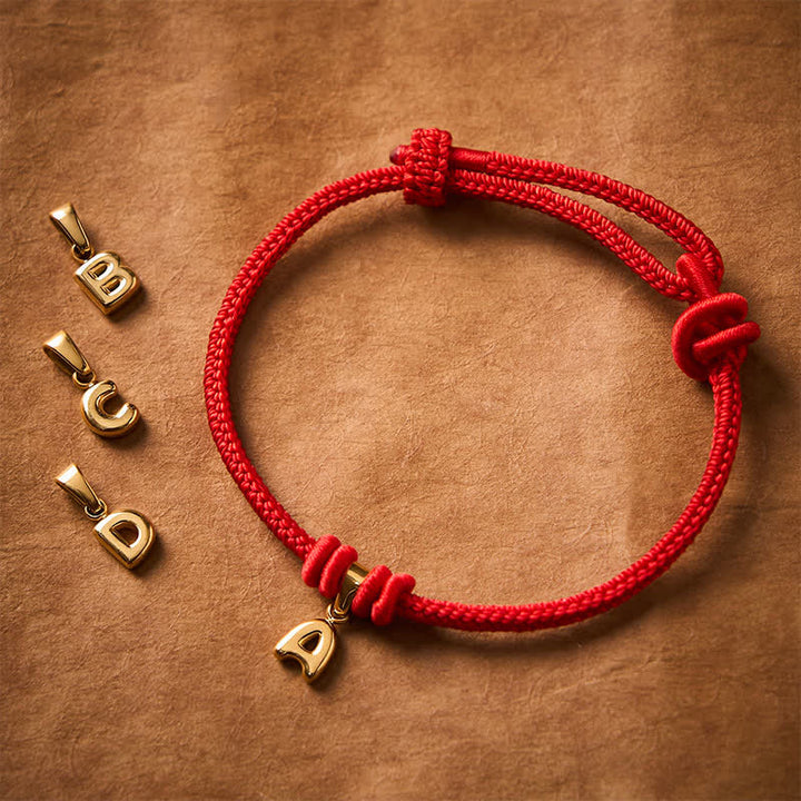 Buddha Stones Braccialetto Faith in acciaio al titanio con lettere e cordino rosso - image 26