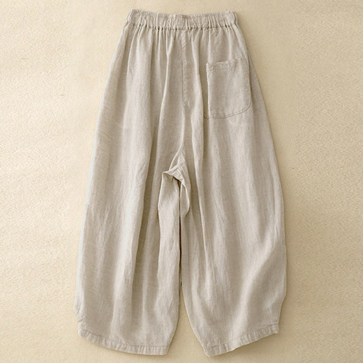 Pantaloni capri corti harem da donna con elastico in vita e tasche, modello estivo Buddha Stones. - image 1