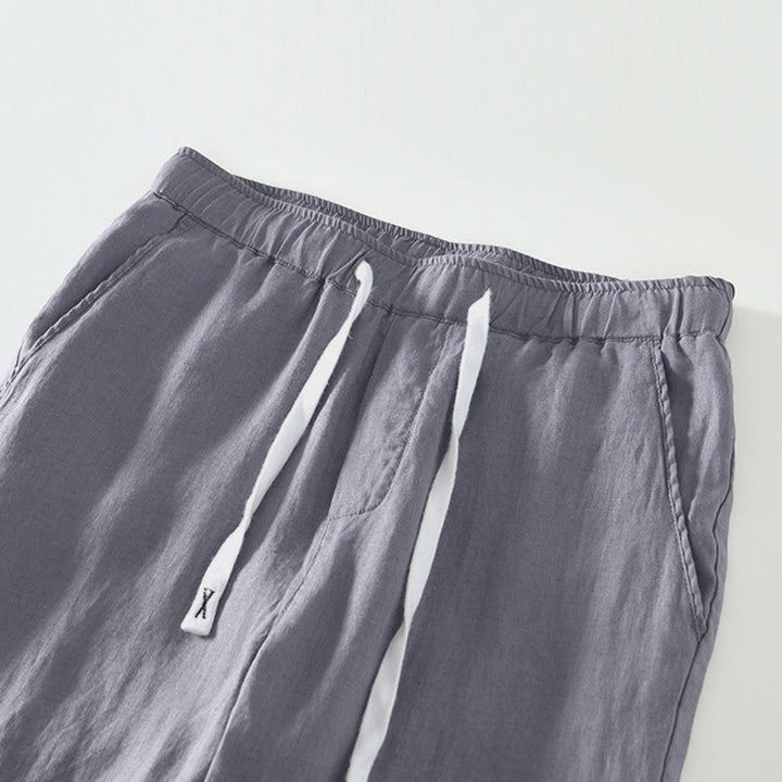 Pantaloni da uomo in lino alla caviglia con coulisse e elastico in vita, con stampa Buddha Stones Fall e tasche. - image 16