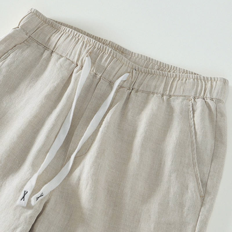 Pantaloni da uomo in lino alla caviglia con coulisse e elastico in vita, con stampa Buddha Stones Fall e tasche. - image 2