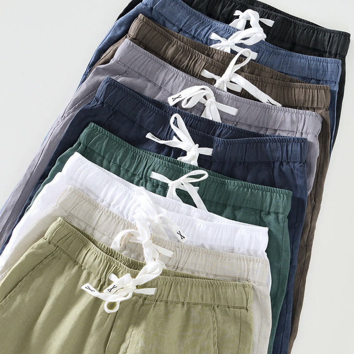 Pantaloni da uomo in lino alla caviglia con coulisse e elastico in vita, con stampa Buddha Stones Fall e tasche. - image 32