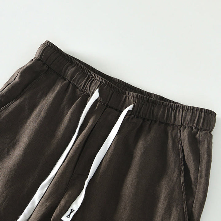 Pantaloni da uomo in lino alla caviglia con coulisse e elastico in vita, con stampa Buddha Stones Fall e tasche. - image 13