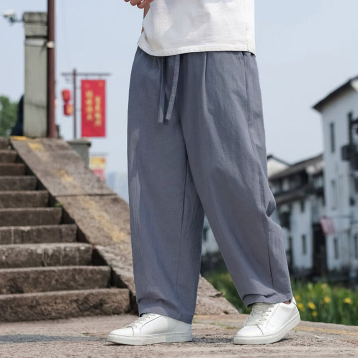 Buddha Stones Pantaloni lunghi estivi casual minimalisti con coulisse in cotone tinta unita da uomo, modello harem con tasca - image 7