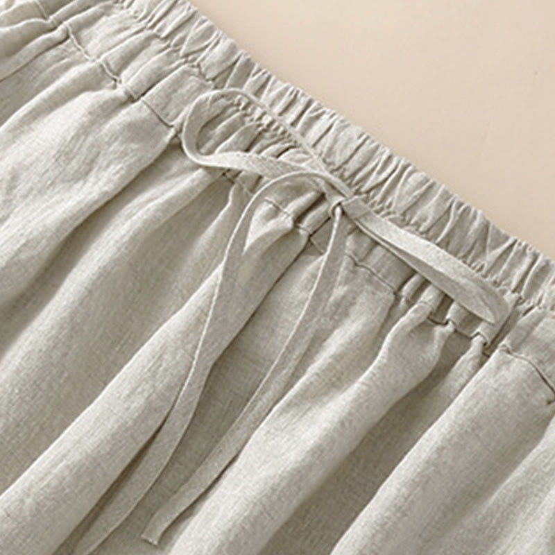 Pantaloni harem larghi con coulisse e tasche, tinta unita, con motivo floreale Buddha Stones. - image 2