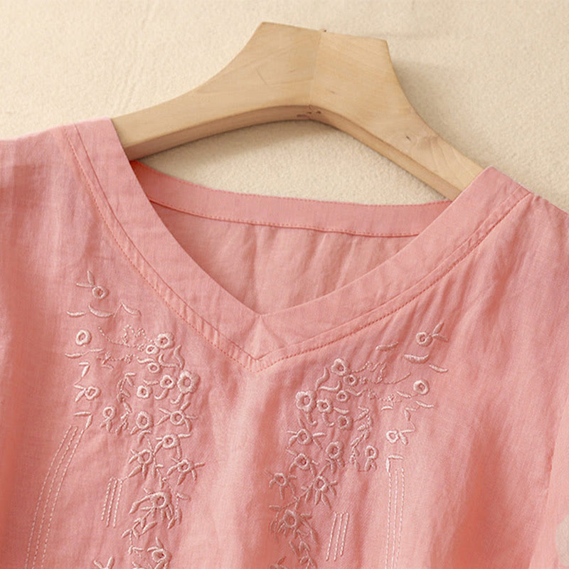 Camicia da donna casual con scollo a V e ricami floreali, modello Buddha Stones, a maniche corte e vestibilità ampia. - image 1
