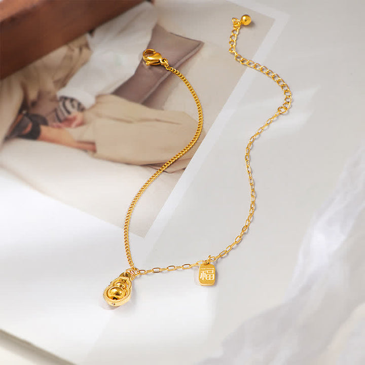 Buddha Stones Cavigliera portafortuna girevole a forma di zucca con personaggio Fu in acciaio al titanio - image 2