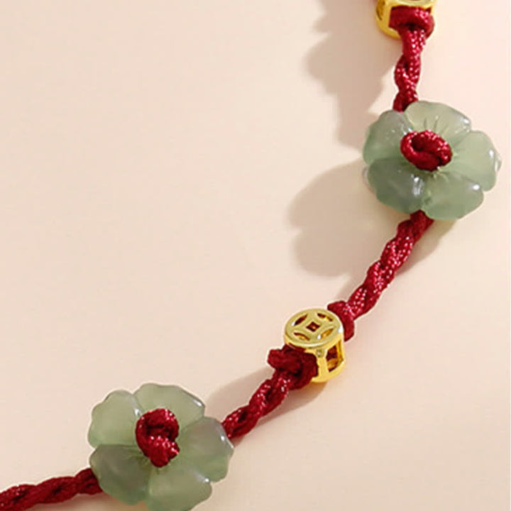 Buddha Stones Cavigliera con ciondolo floreale e cordino rosso intrecciato a mano. - image 8