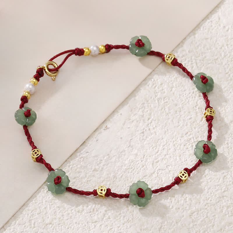 Buddha Stones Cavigliera con ciondolo floreale e cordino rosso intrecciato a mano. - image 2