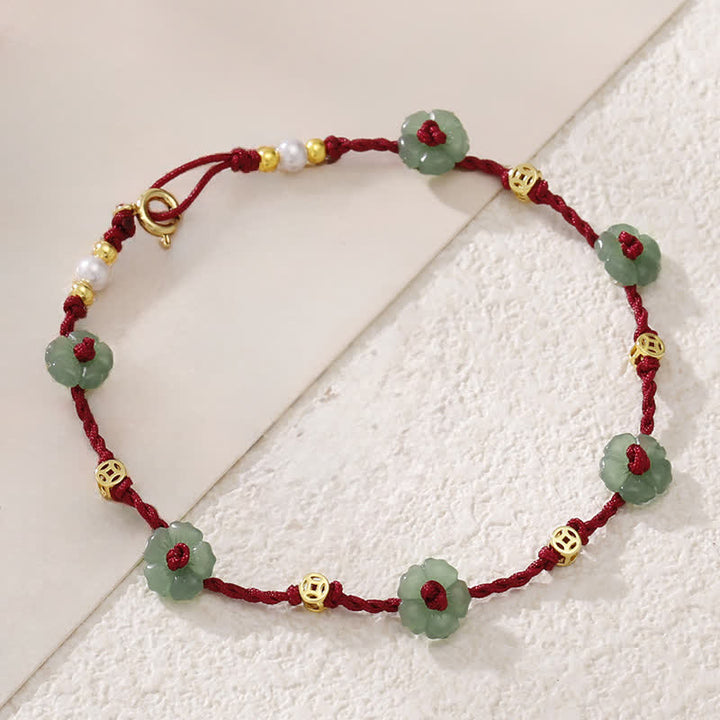 Buddha Stones Cavigliera con ciondolo floreale e cordino rosso intrecciato a mano. - image 2
