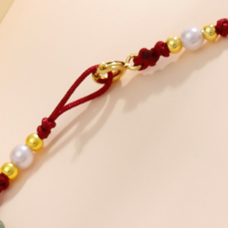 Buddha Stones Cavigliera con ciondolo floreale e cordino rosso intrecciato a mano. - image 11