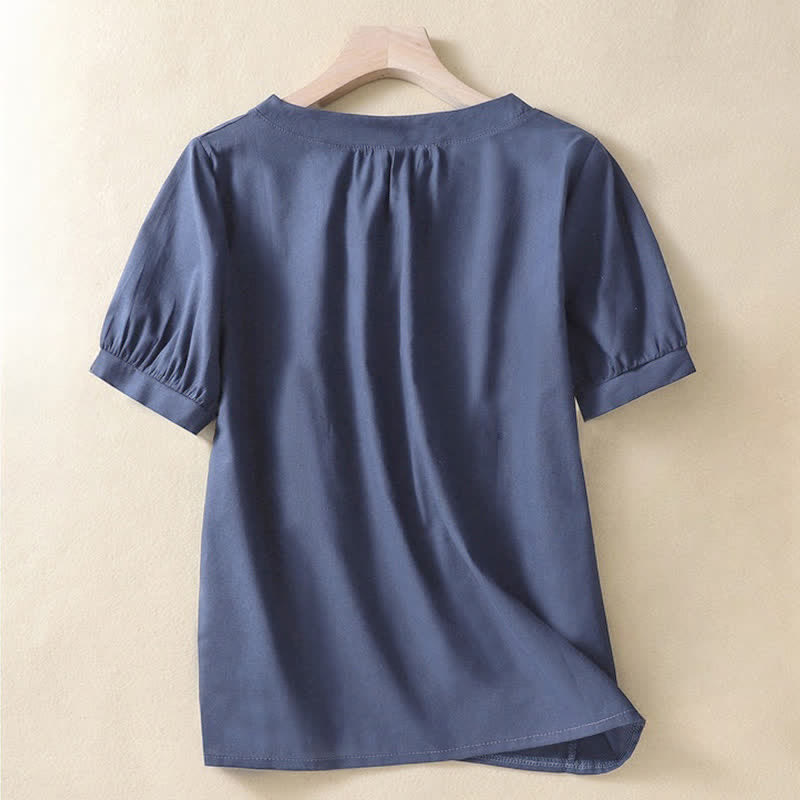 Camicia da donna casual a maniche corte con scollo rotondo e bottoni, con stampa Buddha Stones. - image 7