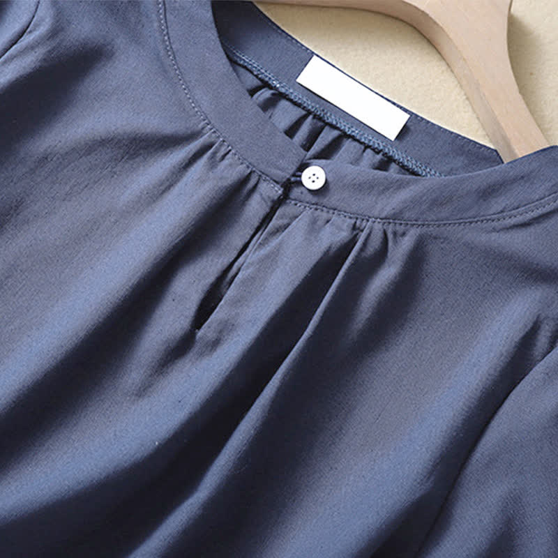 Camicia da donna casual a maniche corte con scollo rotondo e bottoni, con stampa Buddha Stones. - image 9