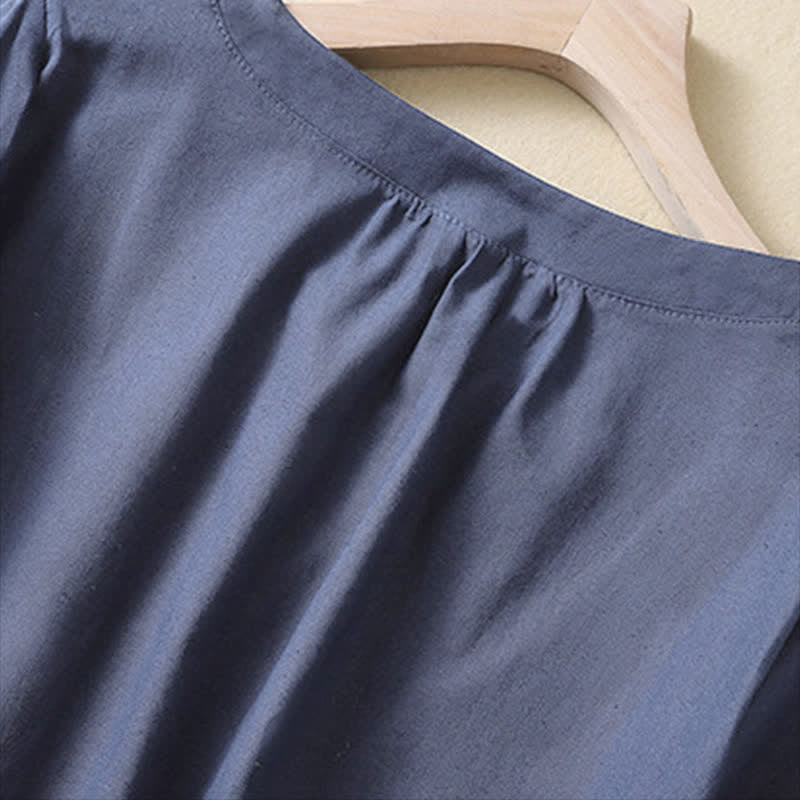 Camicia da donna casual a maniche corte con scollo rotondo e bottoni, con stampa Buddha Stones. - image 8