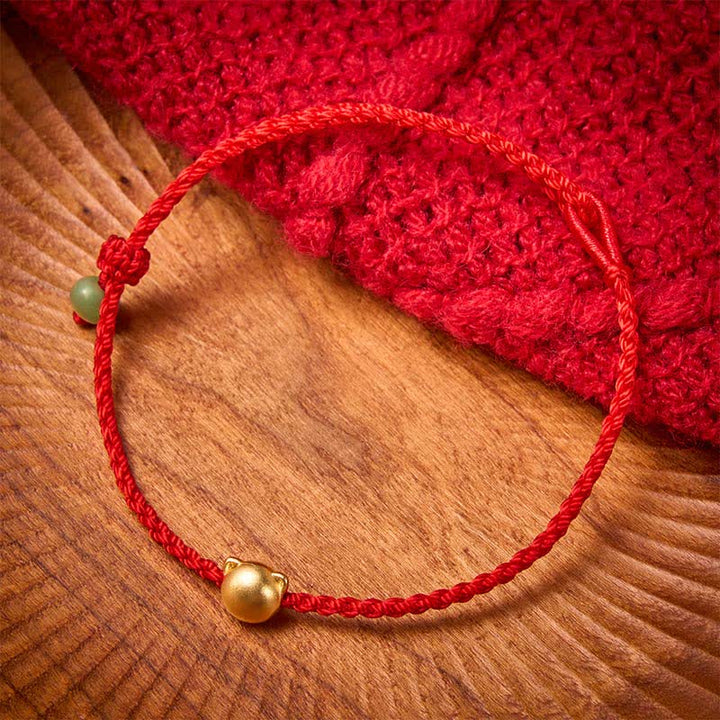 Buddha Stones Braccialetto con testa di gatto in rame e filo rosso in giada - image 1