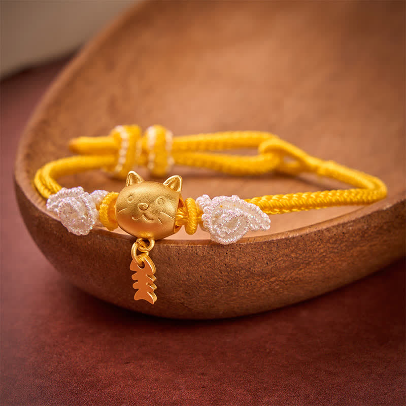 Buddha Stones Braccialetto portafortuna con filo giallo e pesce gatto in rame - image 1