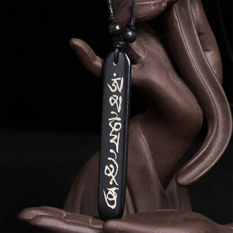 Buddha Stones Collana con perline d'osso intagliate a mano con simbolo Om Mani Padme Hum Pace - image 1