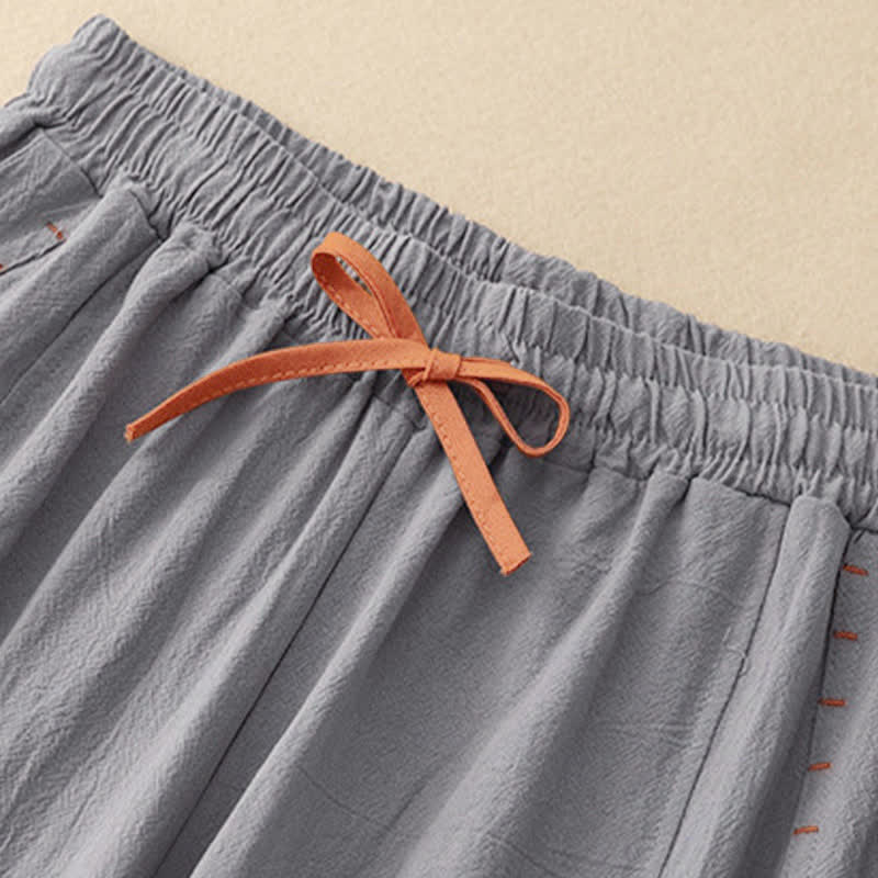 Pantaloni da donna a gamba larga con coulisse e tasche, dal design semplice e casual, con motivo Buddha Stones. - image 16