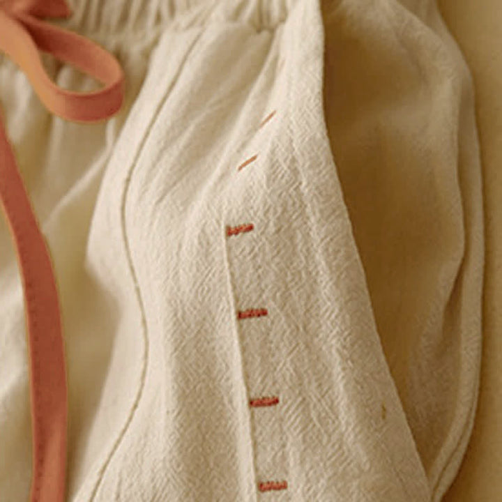 Pantaloni da donna a gamba larga con coulisse e tasche, dal design semplice e casual, con motivo Buddha Stones. - image 10
