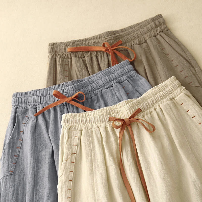 Pantaloni da donna a gamba larga con coulisse e tasche, dal design semplice e casual, con motivo Buddha Stones. - image 21