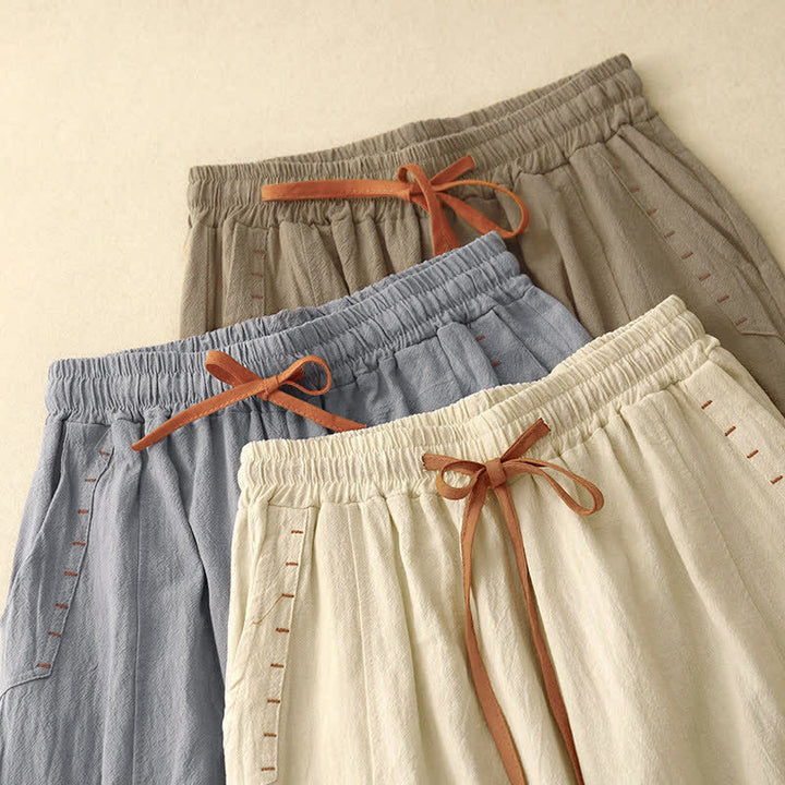 Pantaloni da donna a gamba larga con coulisse e tasche, dal design semplice e casual, con motivo Buddha Stones. - image 21
