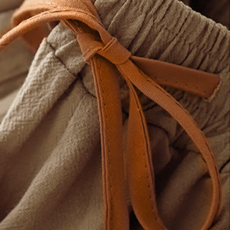 Pantaloni da donna a gamba larga con coulisse e tasche, dal design semplice e casual, con motivo Buddha Stones. - image 2
