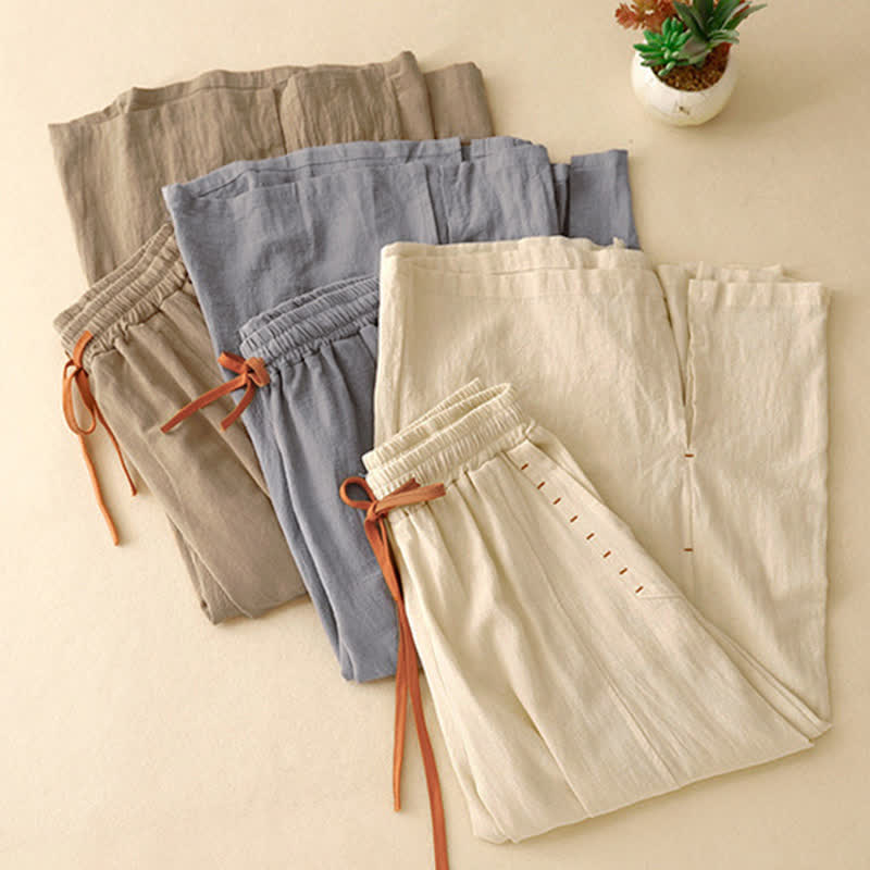 Pantaloni da donna a gamba larga con coulisse e tasche, dal design semplice e casual, con motivo Buddha Stones. - image 20