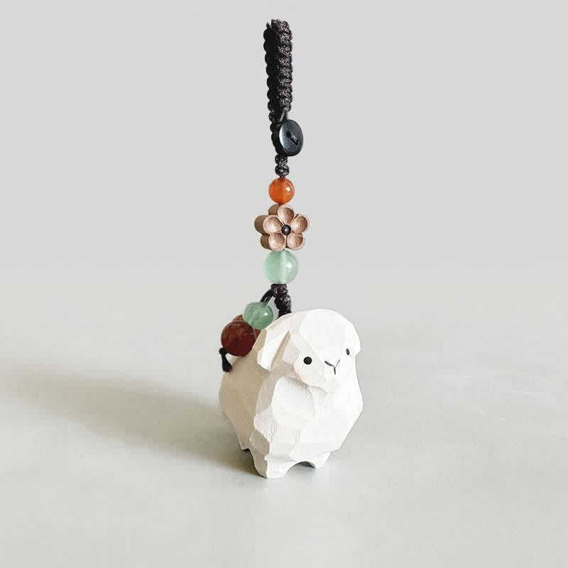 Buddha Stones Portachiavi in ​​legno di tiglio intagliati a mano con Om Mani, Padme, Hum, Prugna e Bossom - Agnello - Fiore di Prugno - image 0