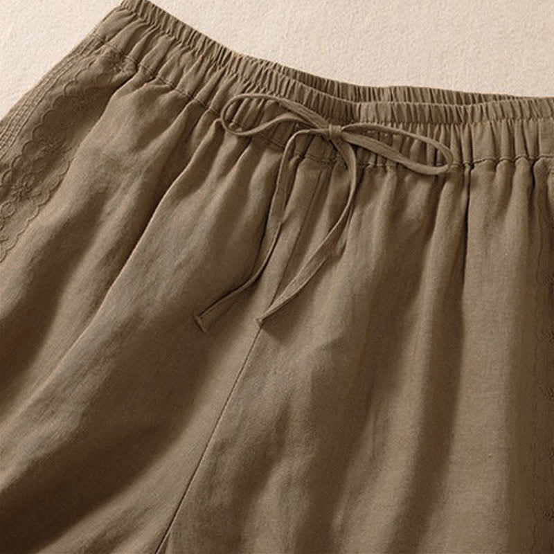 Pantaloncini da donna casual con coulisse e tasche, con ricamo floreale e motivo Buddha Stones. - image 8