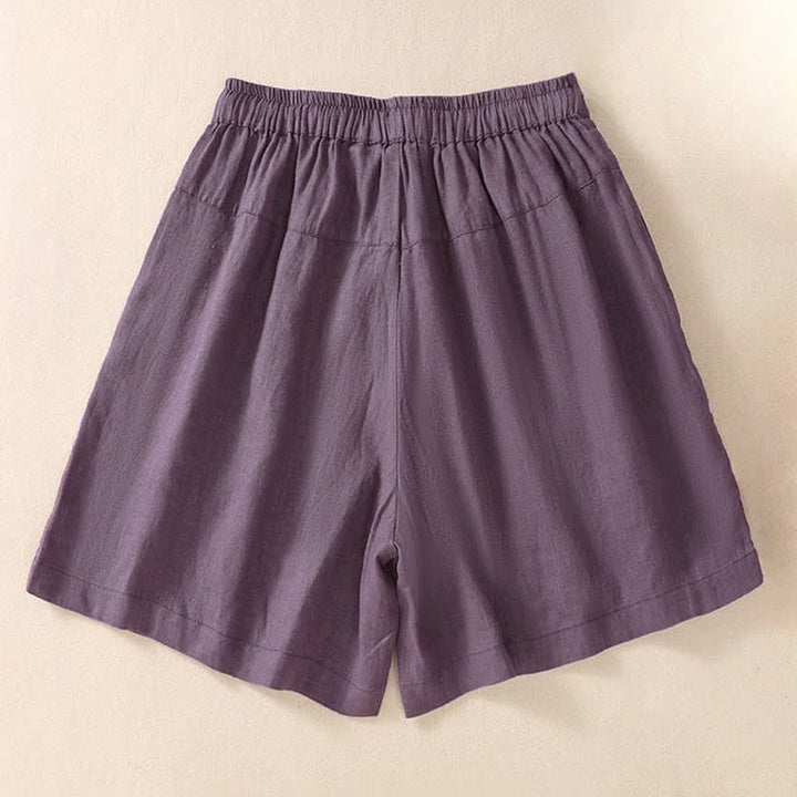 Pantaloncini da donna casual con coulisse e tasche, con ricamo floreale e motivo Buddha Stones. - image 1