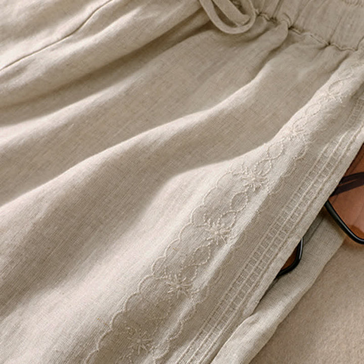 Pantaloncini da donna casual con coulisse e tasche, con ricamo floreale e motivo Buddha Stones. - image 11