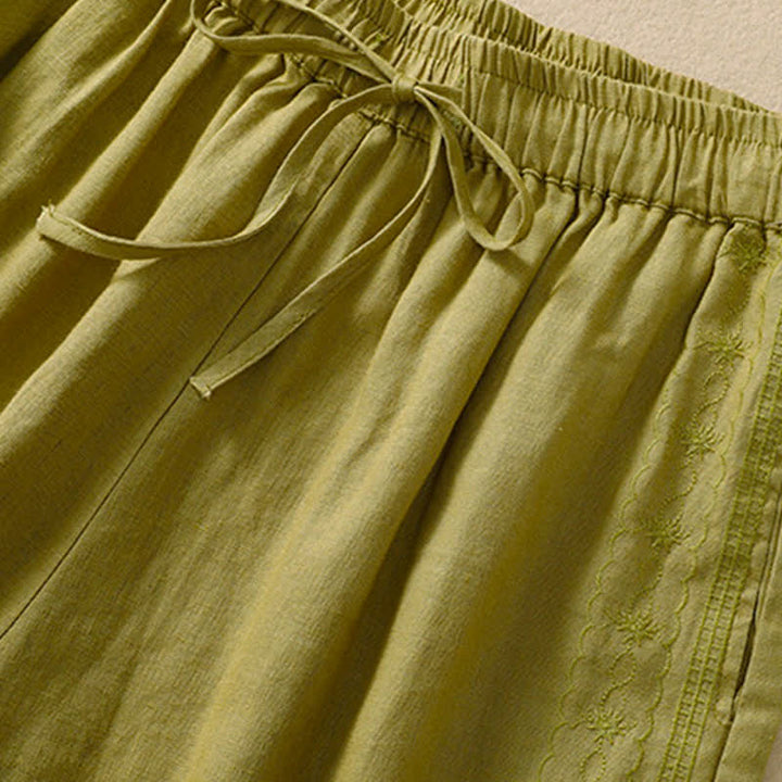 Pantaloncini da donna casual con coulisse e tasche, con ricamo floreale e motivo Buddha Stones. - image 17