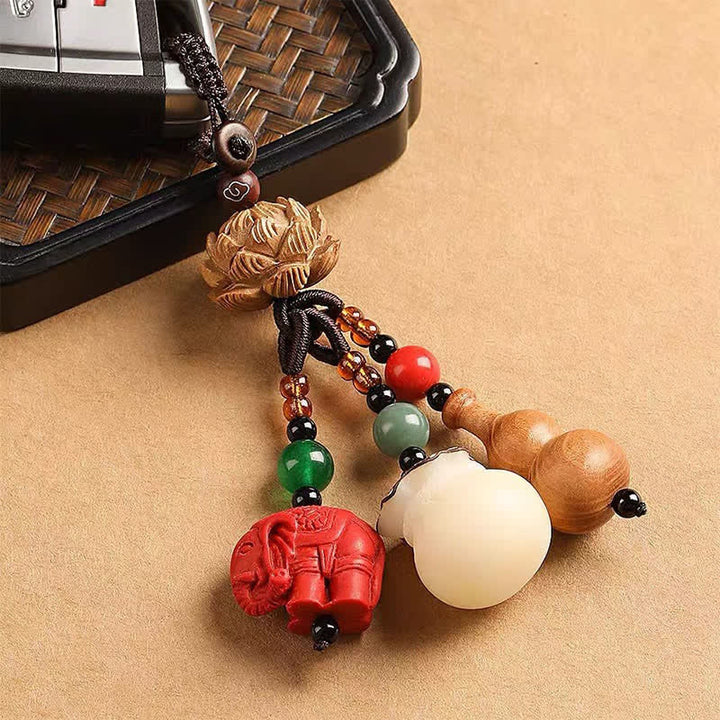Buddha Stones Portafoglio con personaggio Fu in legno di pesca, portafortuna, elefante in cinabro, zucca di loto, portachiavi - image 15