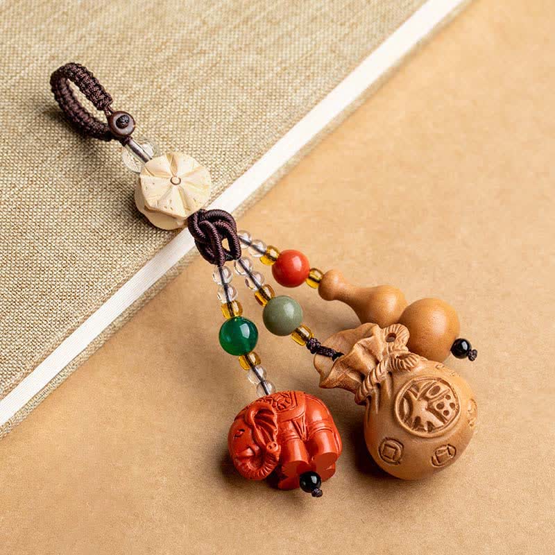 Buddha Stones Portafoglio con personaggio Fu in legno di pesca, portafortuna, elefante in cinabro, zucca di loto, portachiavi - Legno di pesco (Protezione ♥ Purificazione) - image 0