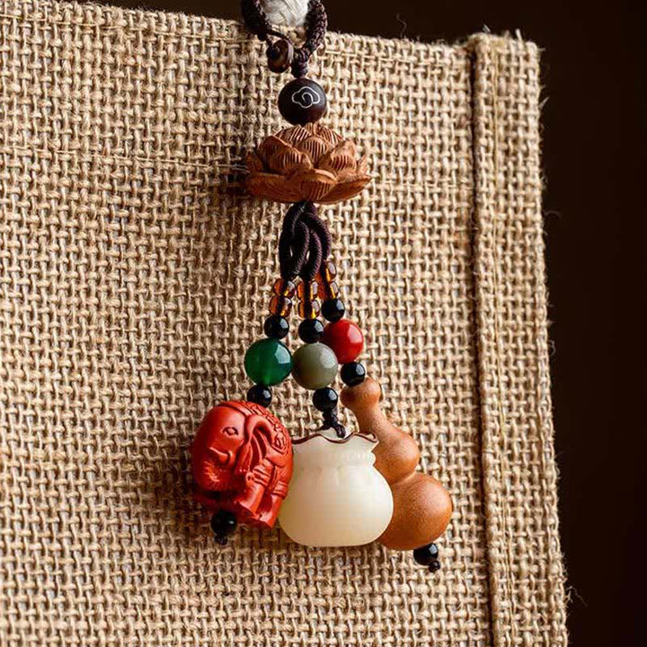 Buddha Stones Portafoglio con personaggio Fu in legno di pesca, portafortuna, elefante in cinabro, zucca di loto, portachiavi - image 18
