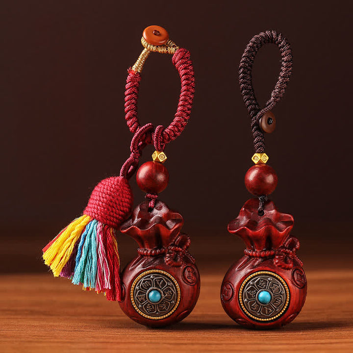Buddha Stones Portachiavi con sacchetto portafortuna in legno di sandalo rosso, con simboli Om Mani, Padme Hum, saggezza e fortuna. - image 11