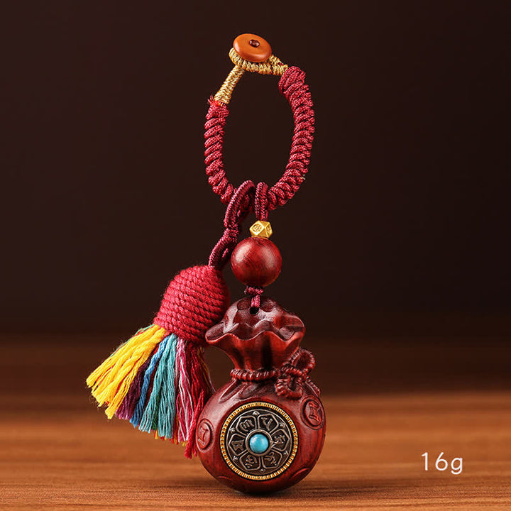 Buddha Stones Portachiavi con sacchetto portafortuna in legno di sandalo rosso, con simboli Om Mani, Padme Hum, saggezza e fortuna. - image 10