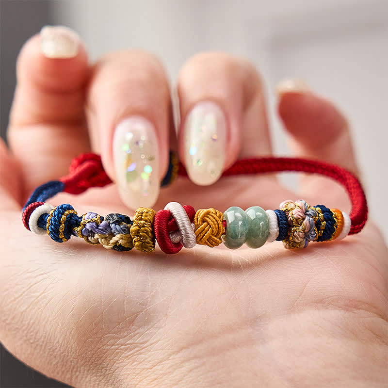 Buddha Stones Braccialetto con perline di giada a forma di fiore di pesco, intrecciate a mano, con cordino rosso e blu navy. - image 3