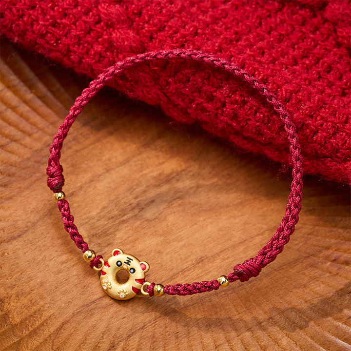 Buddha Stones Bracciale regolabile con cordino rosso intrecciato a mano e fibbia della pace a forma di tigre in rame, per radicamento e messa a terra. - image 1