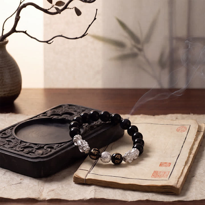Buddha Stones Bracciale della saggezza Double Pi Xiu Om Mani Padme Hum in rame e ossidiana nera con doppio Pi. - image 12