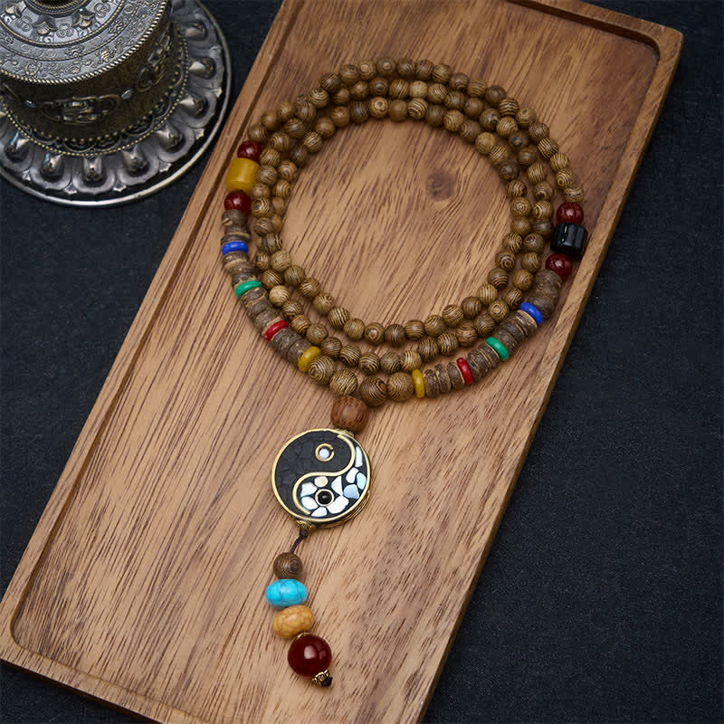 Buddha Stones Collana con perline in legno di wengé, simbolo Yin Yang, equilibrio e radicamento. - Yin Yang (Equilibrio ♥ Armonia) - image 0