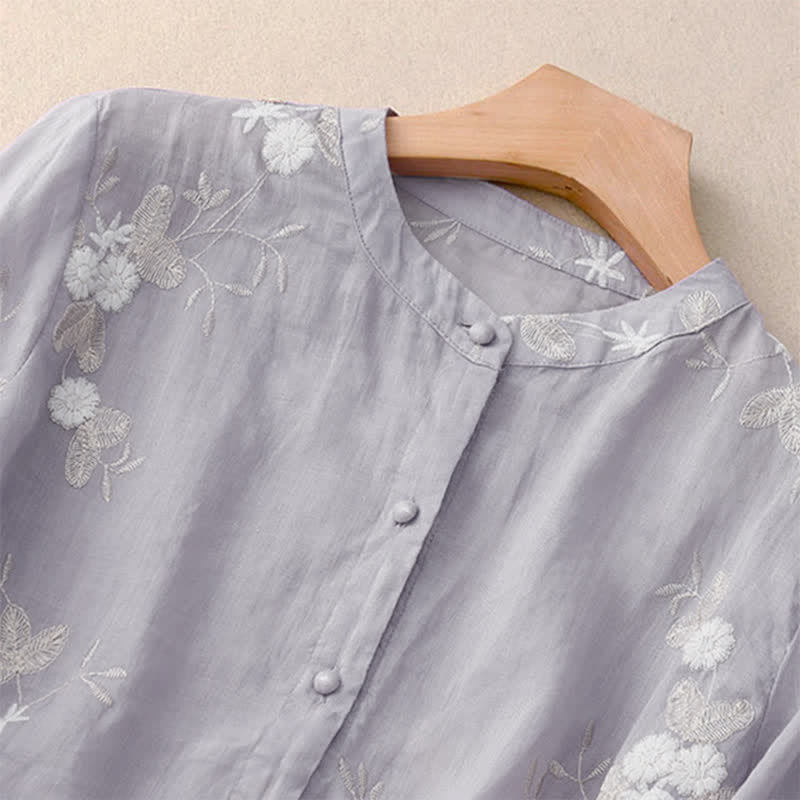 Camicia da donna a maniche corte con scollo rotondo e motivo floreale ricamato a petali, Buddha Stones. - image 1
