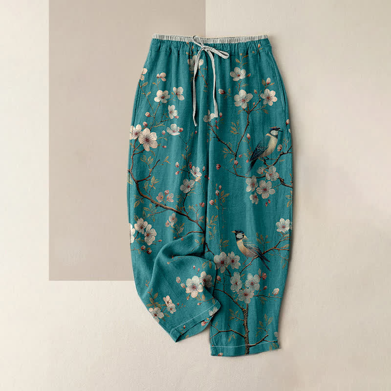 Buddha Stones Eleganti pantaloni da donna in puro cotone con elastico in vita e tasche, fantasia a fiori di ciliegio e uccelli. - Turchese medio - US16, UK/AU20, EU48 (3XL) - image 0