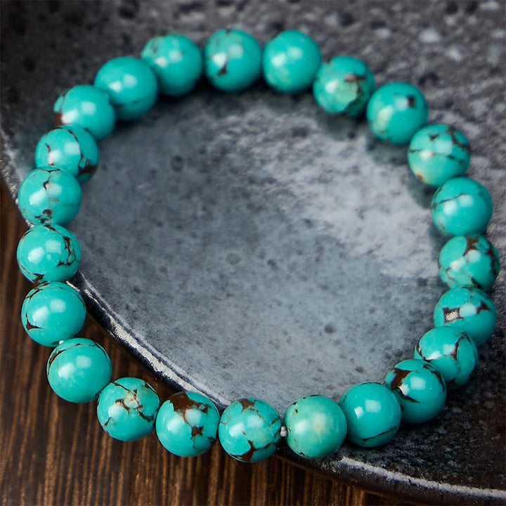 Buddha Stones Bracciale protettivo con perline turchesi - image 1