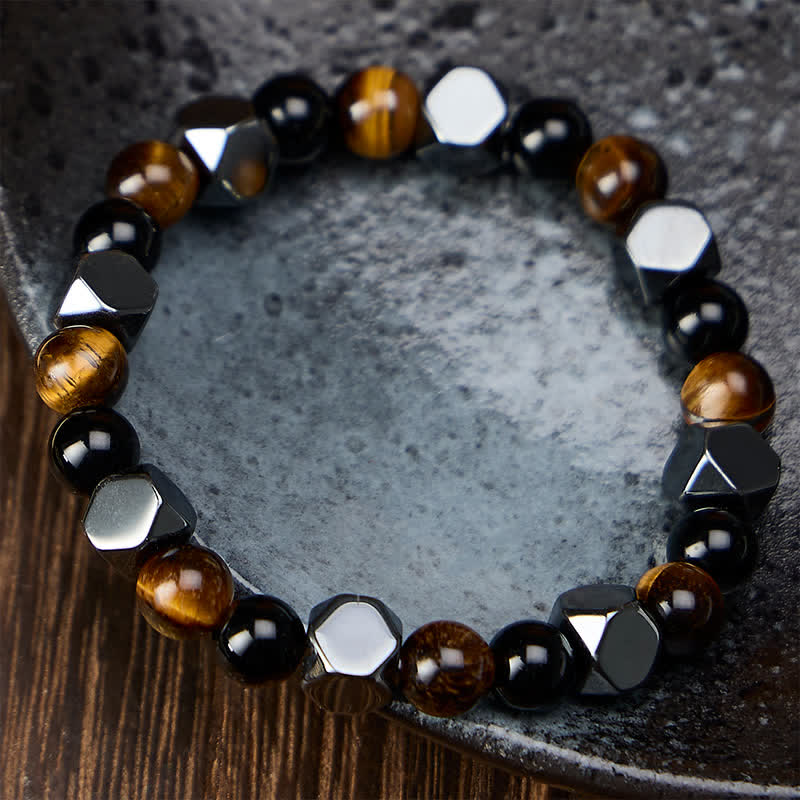 Buddha Stones Bracciale protettivo sfaccettato in ossidiana nera, occhio di tigre ed ematite. - image 1
