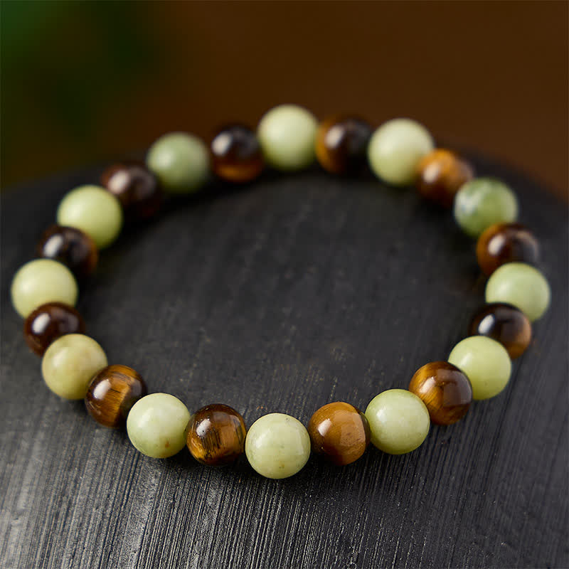 Buddha Stones Bracciale con perline rotonde in giada occhio di tigre, simbolo di forza e resistenza. - image 2