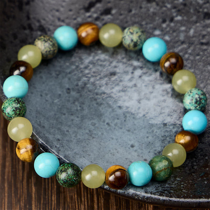 Buddha Stones Bracciale protettivo con perline di giada ciano occhio di tigre naturale e turchese - image 1