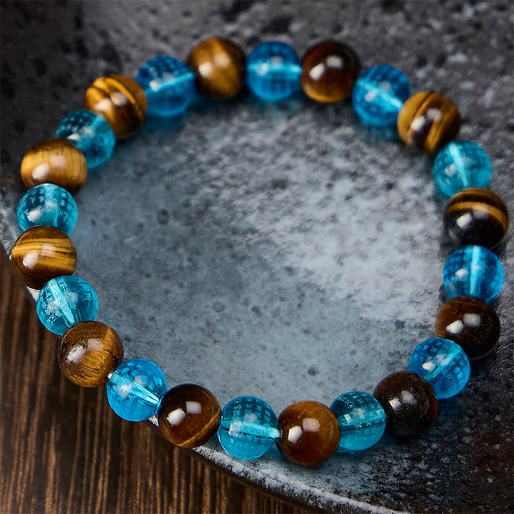 Buddha Stones Braccialetto rotondo con perline di vetro Tiger Eye Blue Liuli, colore Courage. - image 2